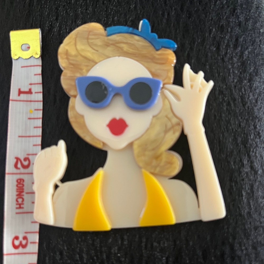 Stylish Brooch with Blue and Yellow Accents